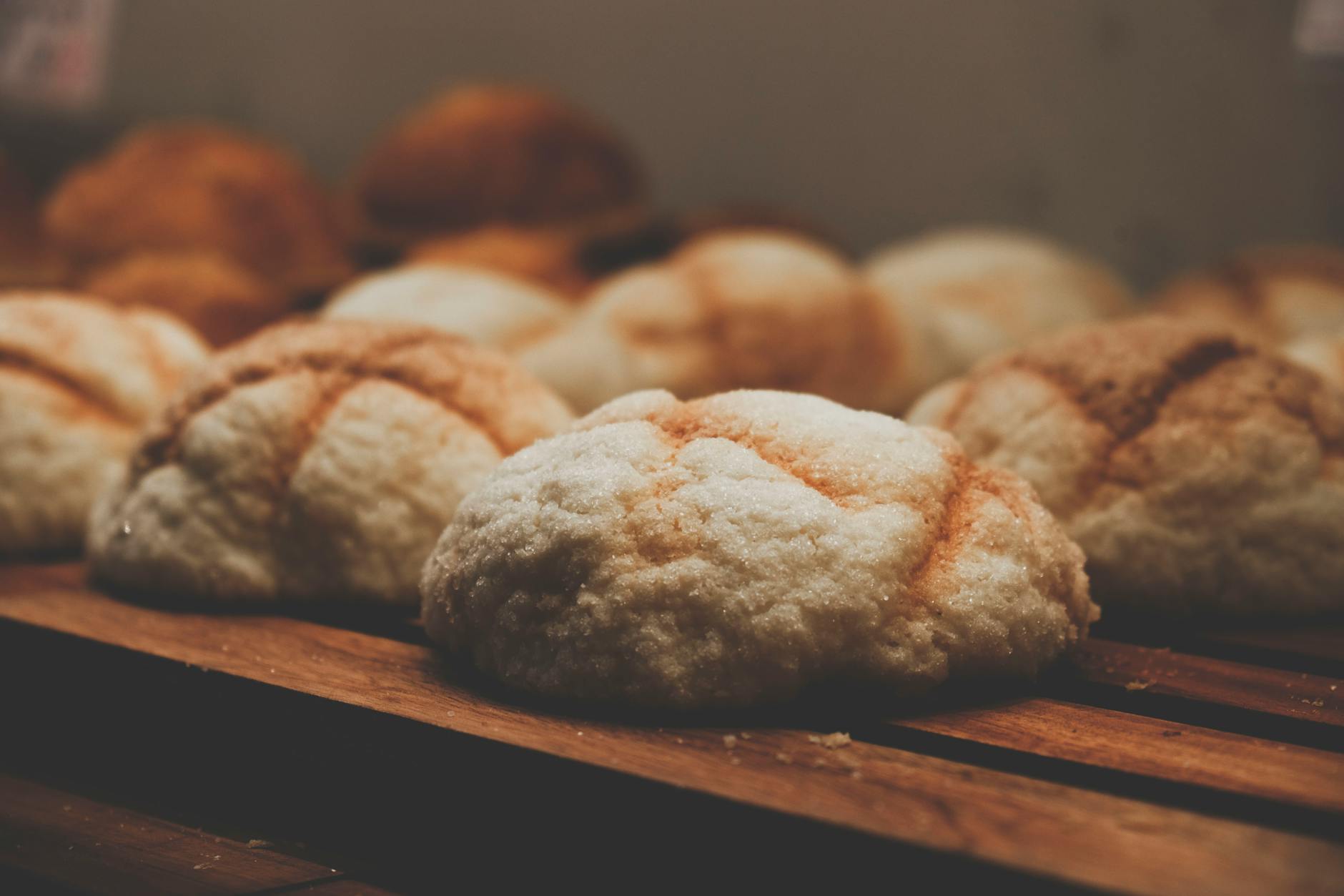 baked cookies on brown wooden surface